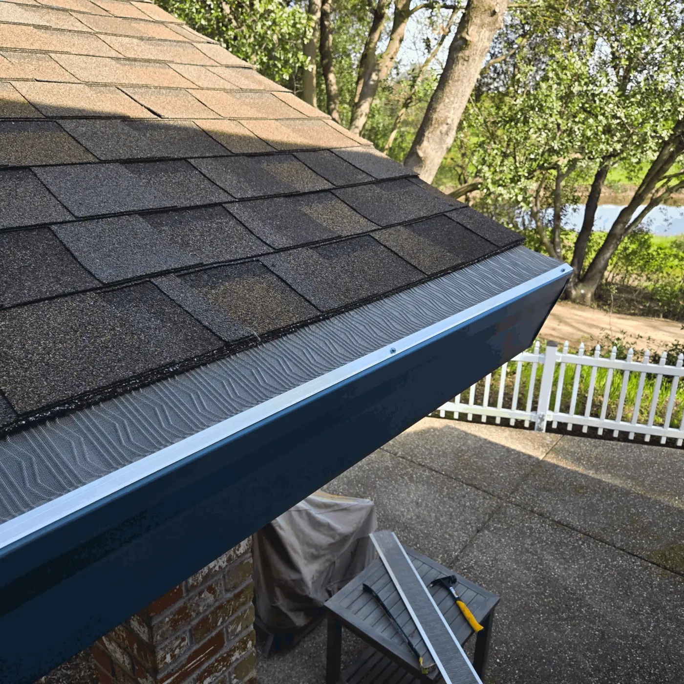 Finished gutter guard along the roofline of a Sacramento-area home