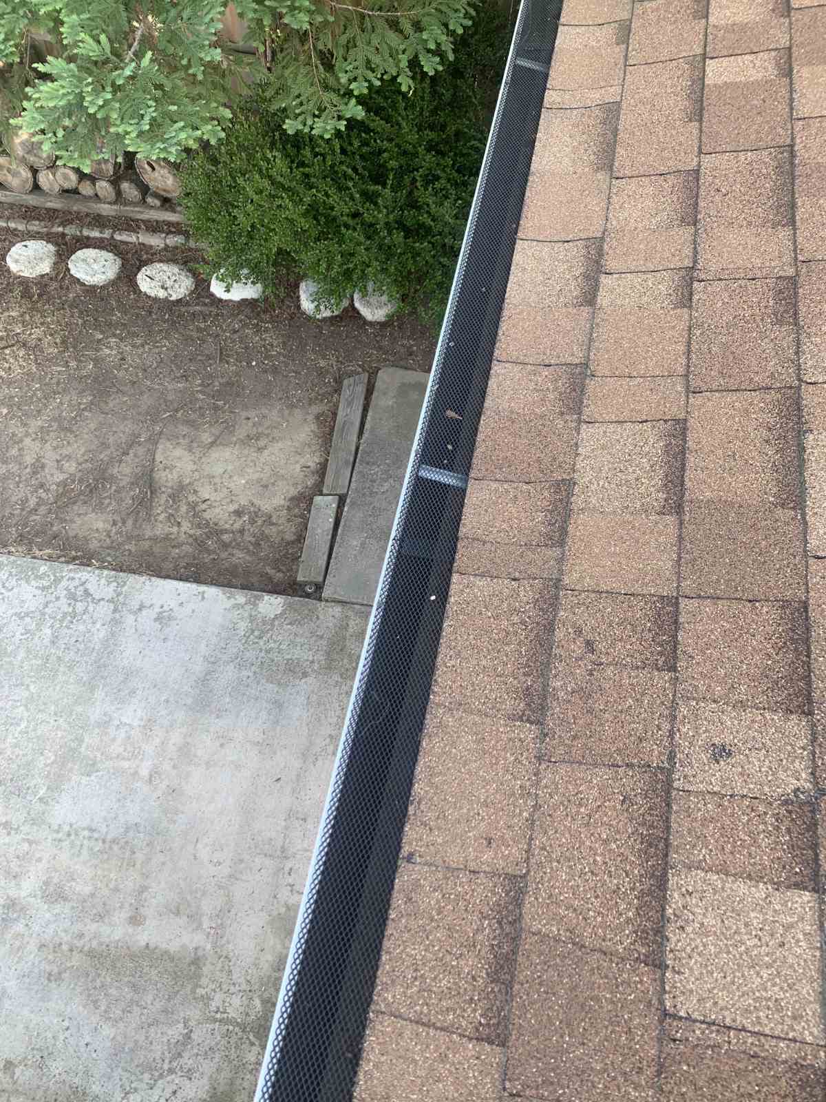 Mesh gutter guard viewed from roof on Sacramento home