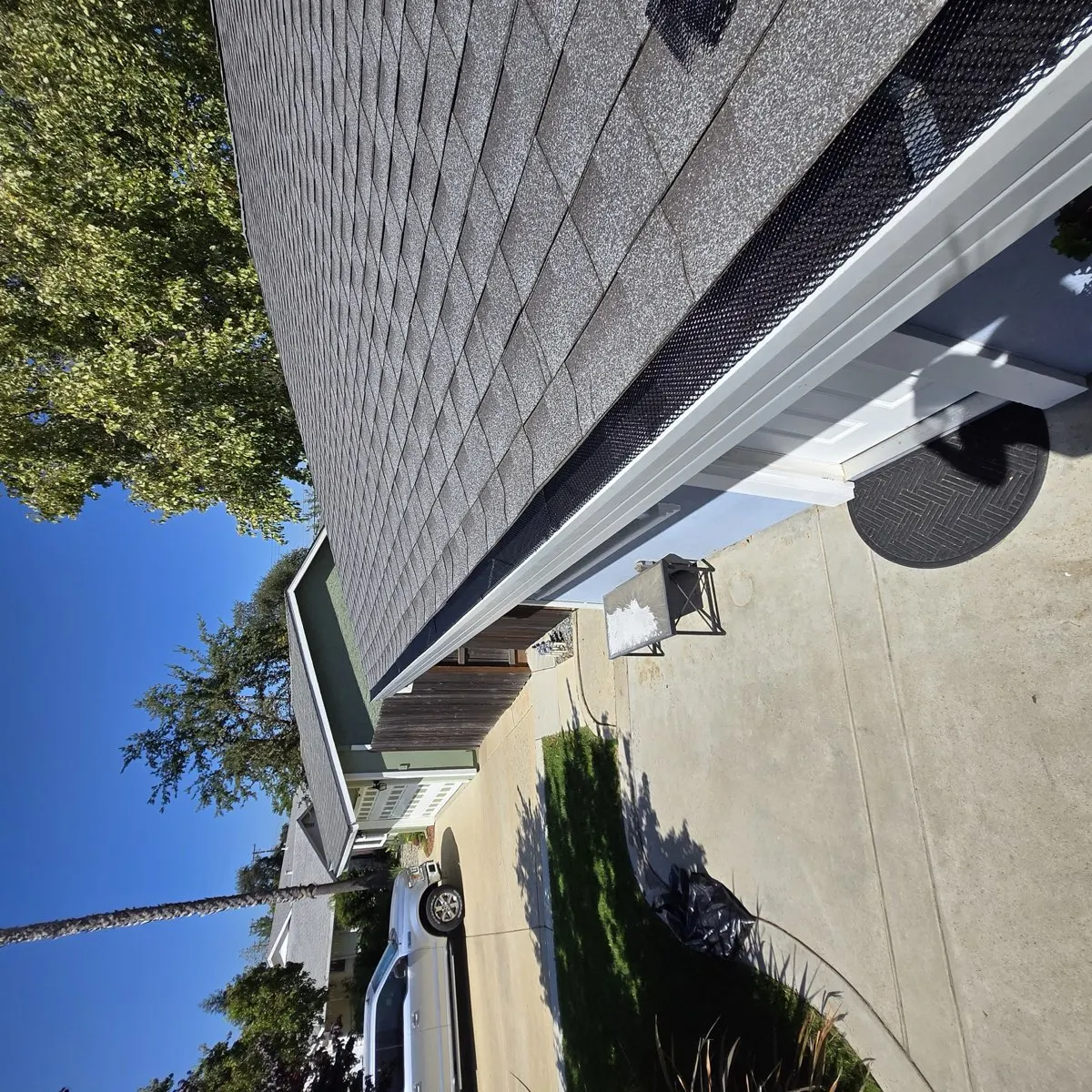Completed gutter guard installation on Sacramento stucco home